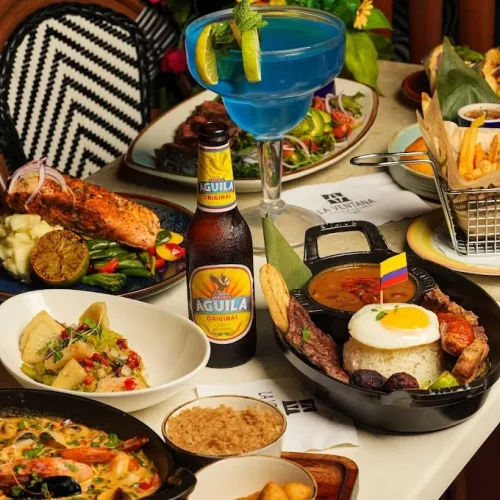 mesa con los platillos del restaurante la ventana miami